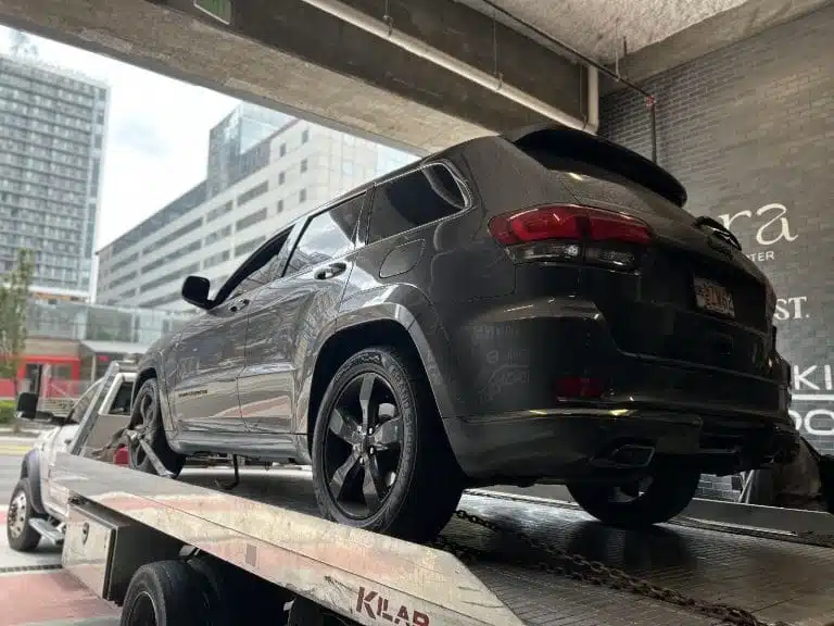 Luxury Car towing by Amanah tow